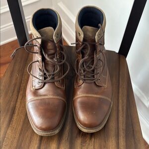 Brown Leather Ankle High Boots with Lace Up Design and Rounded Toe